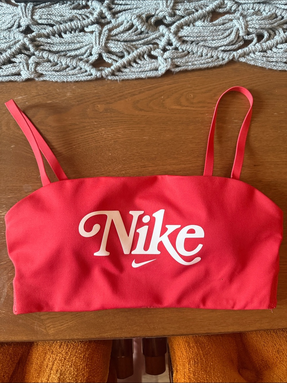 Nike Red Sports Bra with convertible straps for crisscross back.